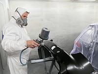 Teilelackierung in eigener Lackierkabine Teilelackierung in eigener Lackierkabine